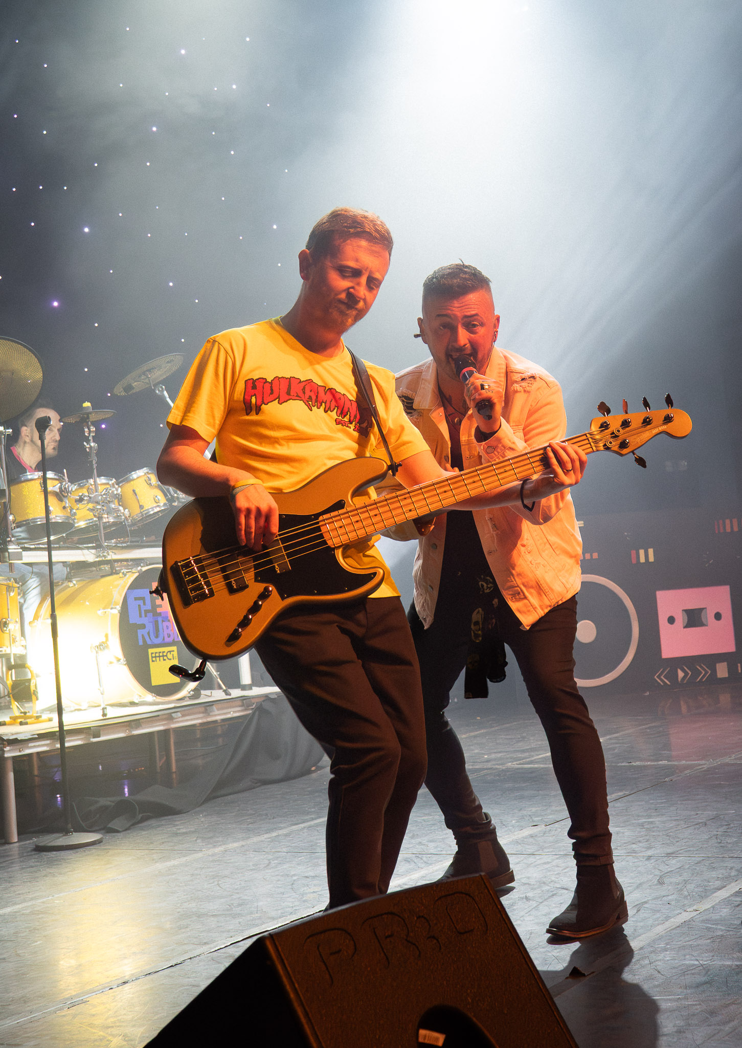 The Rubix Effect band members performing in perfect synchronization