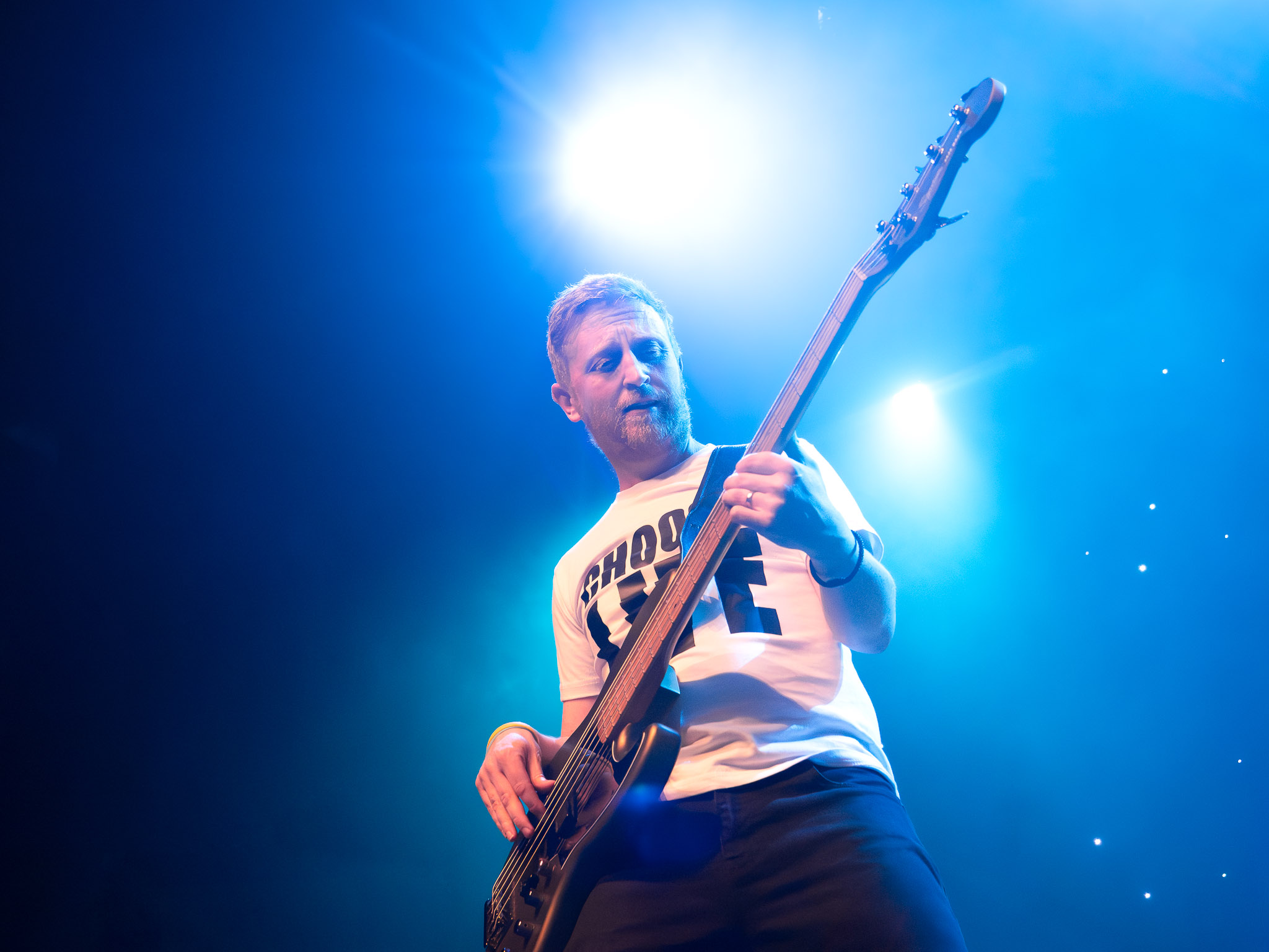 Bass guitar player solo performance snapshot